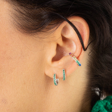Huggie earrings with green stones in silver by Scream Pretty