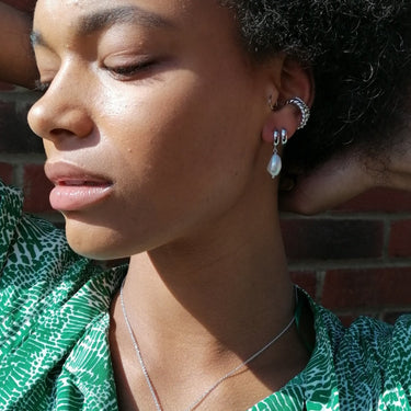 Baroque Pearl Huggie Earrings in Silver by Scream Pretty