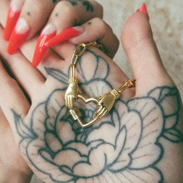 Heart in My Hands Necklace by Scream Pretty