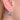 Silver oval hoop earrings with sparkling clear baguette-cut stones by scream pretty australia