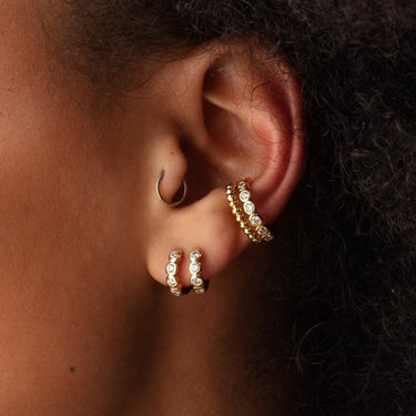 Bezel Huggie Earrings with clear stones in Gold by Scream Pretty