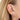 Huggie earrings with blue stones in Gold by Scream Pretty