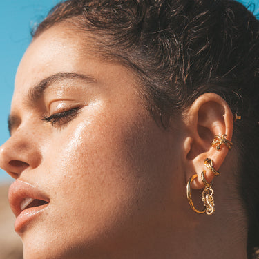 Cobra Snake Huggie Hoop earrings in Gold by Scream Pretty